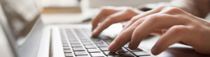 Hands typing on a computer Stein Sperling Articles