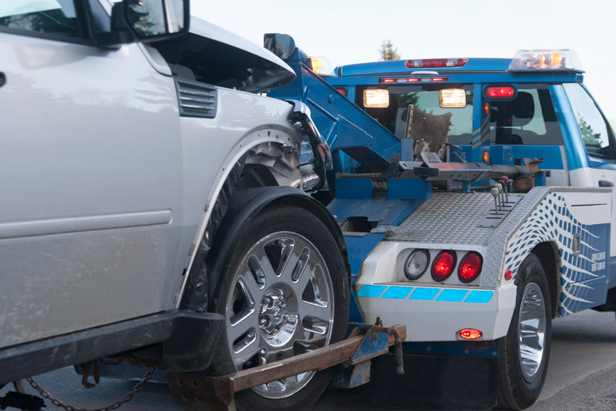 Car on the back of tow truck