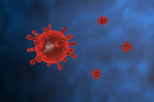3D render of a red virus against a blue background - Covid-19 Coronavirus concept