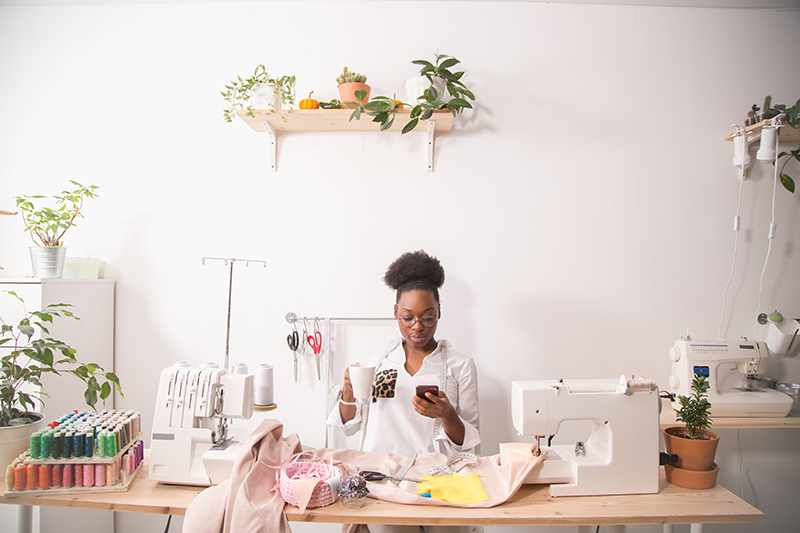 Woman Running Home Business Mobile Payment